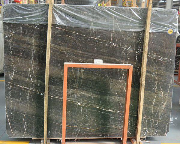 Gold vein and black wood grain marble slab