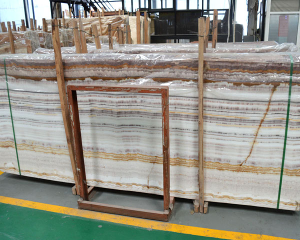 Fantastic color golden vein white onyx marble slab