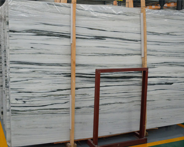 Emerald green wood grain white marble slab