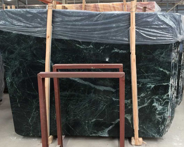 Dark green marble slab with white veins