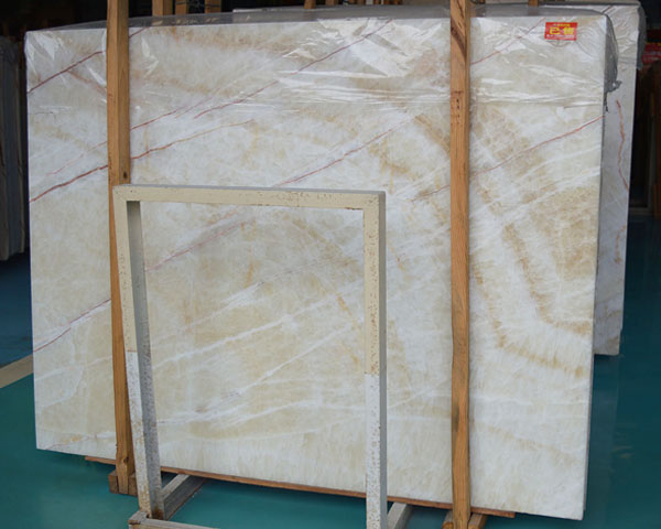 China golden silk white onyx slab price