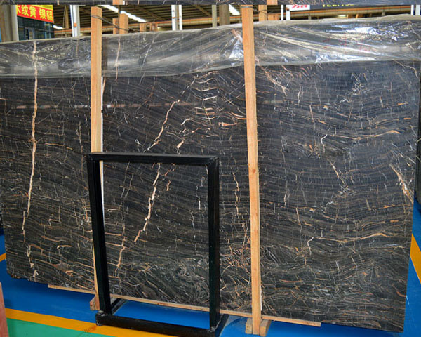 Natural golden wavy grain and black marble slab